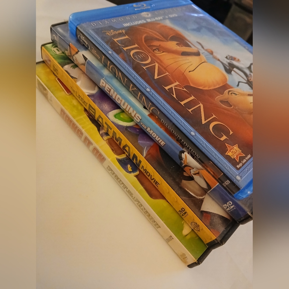 DVD Collection: Lion King, Penguins, Batman